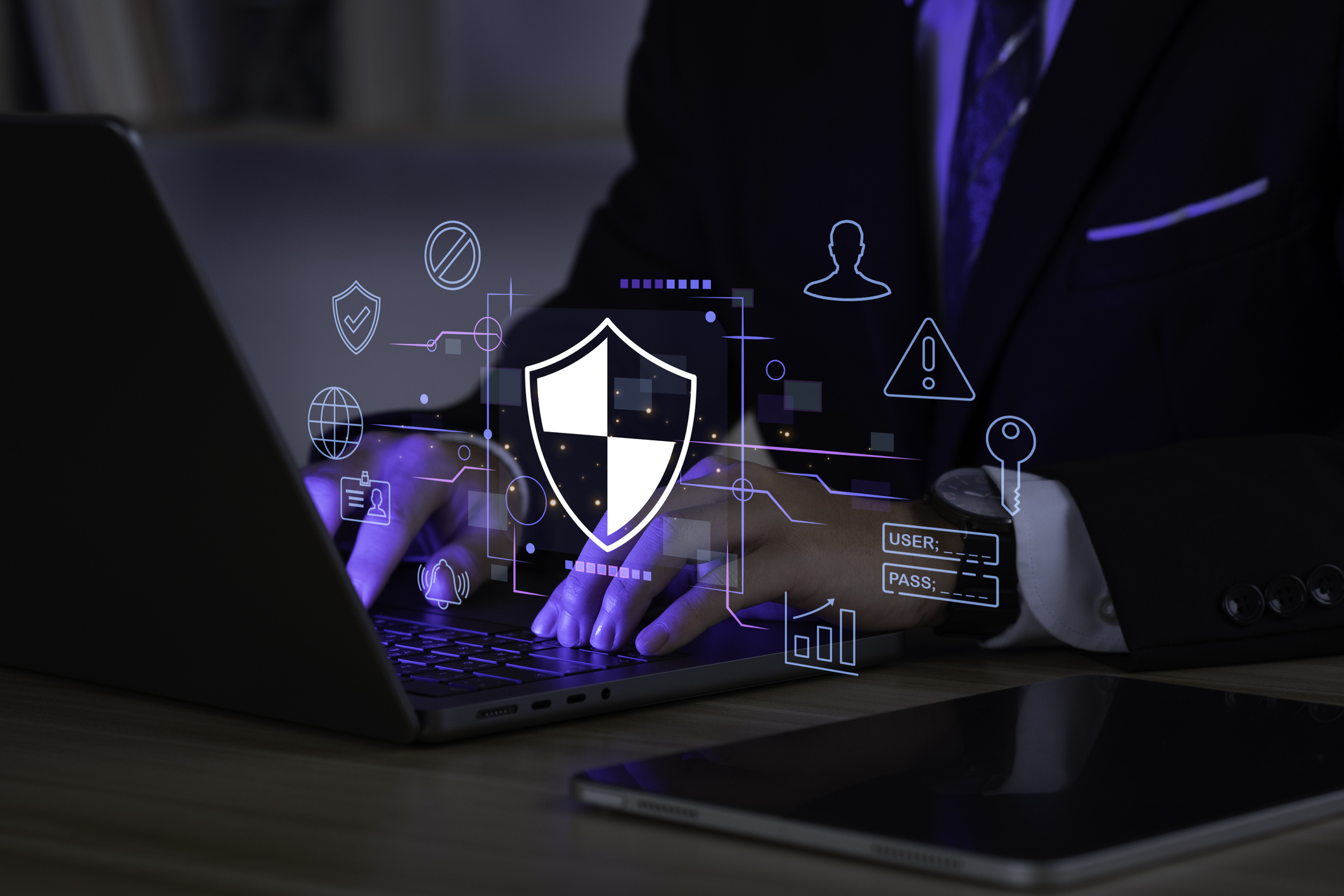 Business person using laptop with digital padlock